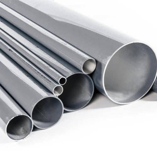 Various sizes of steel pipes on white background.
